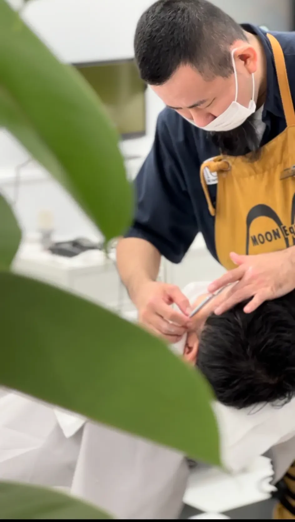 Manager Takashi Morisaki working in the shop
